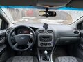 2010 Ford Focus II Рестайлинг, чёрный, 470000 рублей - вид 2