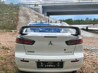 2011 Mitsubishi Lancer X Рестайлинг, белый, 640000 рублей, вид 3