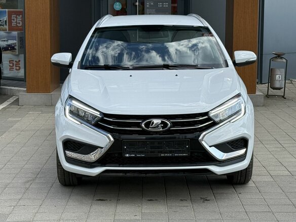 2026 Lada (ВАЗ) Vesta SW I Рестайлинг (NG), белый, 1815000 рублей - вид 1