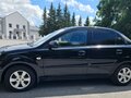 2011 Kia Rio II Рестайлинг, чёрный, 550000 рублей - вид 6