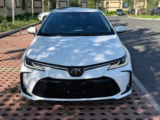 2023 Toyota Corolla XII (E210), белый, 1590099 рублей, вид 2