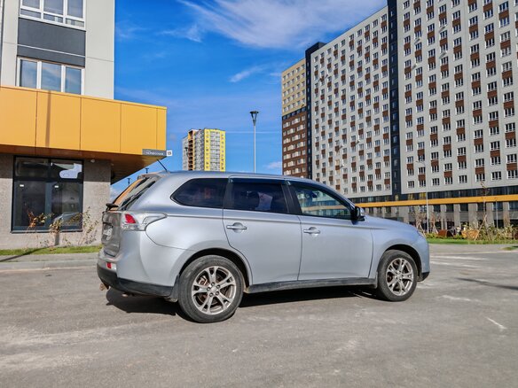 2012 Mitsubishi Outlander III, серый, 1090000 рублей - вид 3