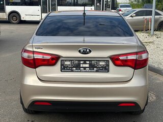 2015 Kia Rio 6-speed III, бежевый, 735000 рублей, вид 5