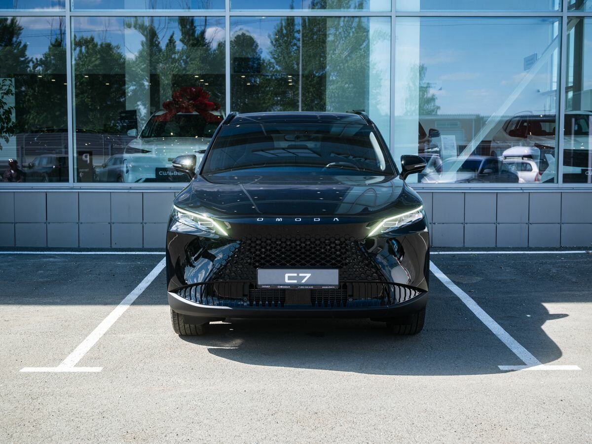 Открыть фотографии: Omoda C7