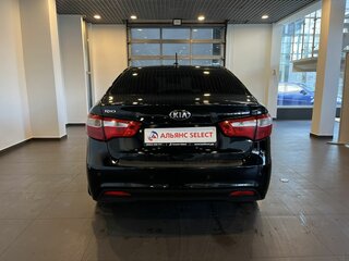 2014 Kia Rio 4-speed III, чёрный, 711000 рублей, вид 4