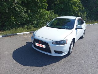2011 Mitsubishi Lancer X Рестайлинг, белый, 750000 рублей, вид 3