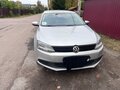 2014 Volkswagen Jetta VI, серебристый - вид 2
