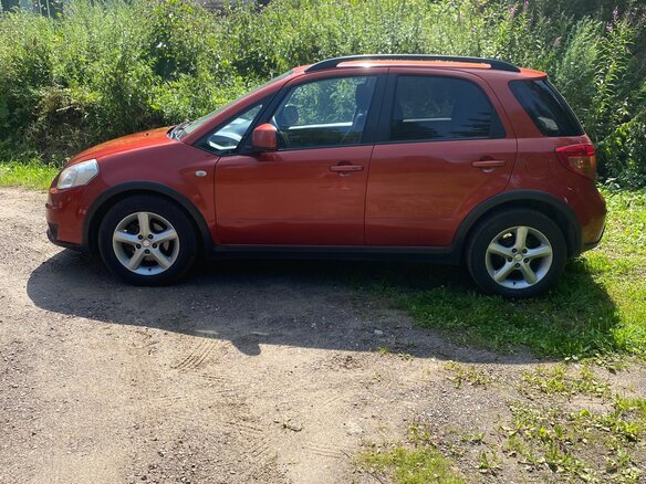 2008 Suzuki SX4 I (Classic), красный - вид 5