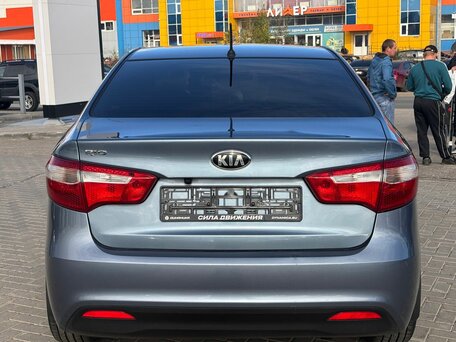 2014 Kia Rio 5-speed III, голубой, 1050000 рублей, вид 5