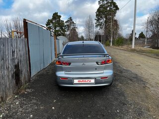 2010 Mitsubishi Lancer X, серебристый, 830000 рублей, вид 2