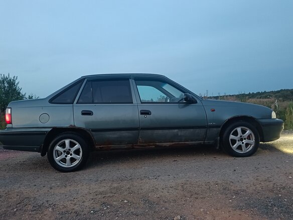 2004 Daewoo Nexia I, зелёный, 109969 рублей - вид 5