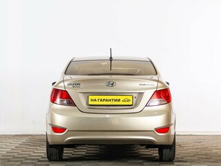 2012 Hyundai Solaris I, золотистый, 869000 рублей, вид 5