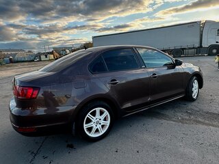 2014 Volkswagen Jetta VI Рестайлинг, коричневый, 720000 рублей, вид 5