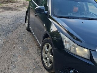 2010 Chevrolet Cruze I, чёрный, 570000 рублей, вид 1