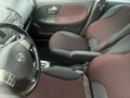 2008 Nissan Note I, пурпурный, 699000 рублей - вид 5
