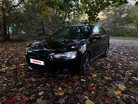 2011 Mitsubishi Lancer X Рестайлинг, чёрный, 730000 рублей, вид 2