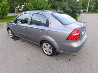 2011 Chevrolet Aveo I Рестайлинг, серебристый, 449000 рублей, вид 2