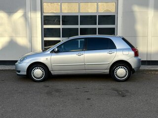 2002 Toyota Corolla IX (E120, E130), серый, 560000 рублей, вид 2