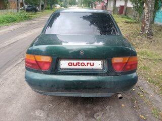 1998 Mitsubishi Carisma I, зелёный, 110000 рублей, вид 2