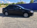 2014 Mitsubishi Lancer X Рестайлинг, чёрный, 980000 рублей - вид 4