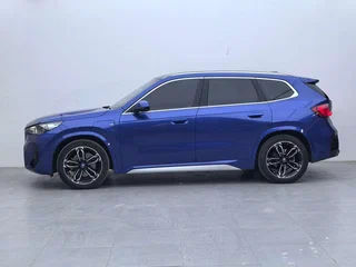 2024 BMW iX1 eDrive 25L, синий, 3599000 рублей, вид 4