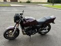 1996 Honda CB 400 Super Four, красный - вид 1
