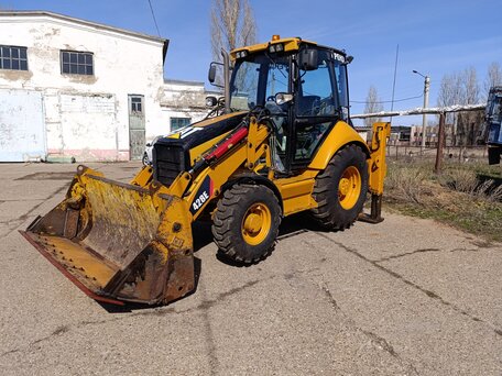 2008 Caterpillar 428, жёлтый, 5500000 рублей, вид 1