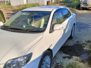 2006 Toyota Corolla Axio X (E140, E150), белый, 750000 рублей, вид 1
