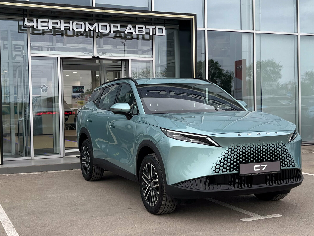 Открыть фотографии: Omoda C7