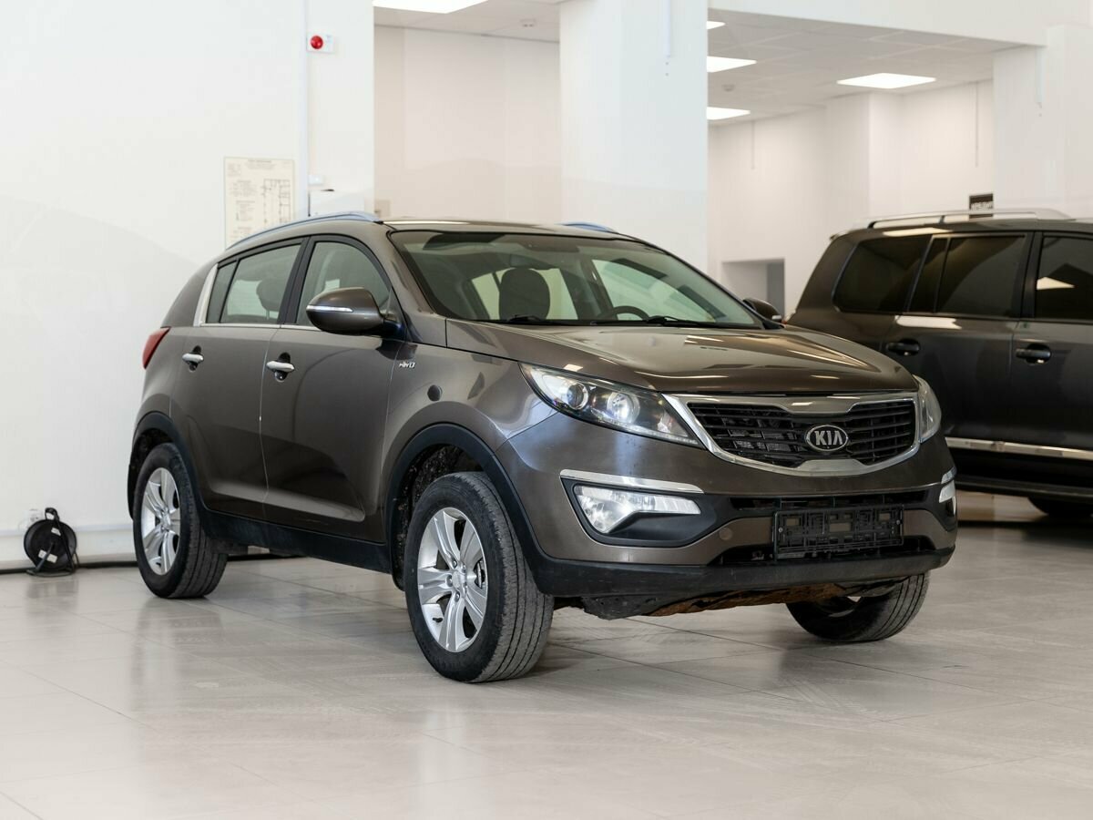 Открыть фотографии: Kia Sportage III