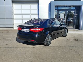 2012 Kia Rio 5-speed III, чёрный, 579000 рублей, вид 5