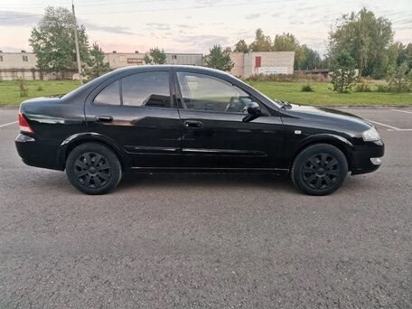 2010 Nissan Almera Classic I, чёрный, вид 4
