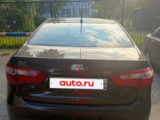 2014 Kia Rio 6-speed III, коричневый, 700000 рублей, вид 5