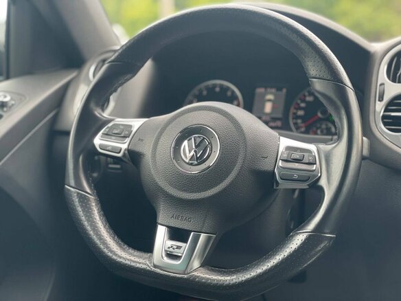 2014 Volkswagen Tiguan I Рестайлинг, чёрный - вид 17