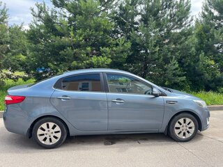 2014 Kia Rio 5-speed III, голубой, 799000 рублей, вид 5