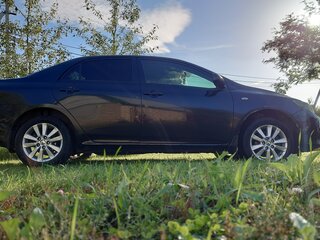 2008 Toyota Corolla X (E140, E150), чёрный, 750000 рублей, вид 1