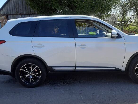 2016 Mitsubishi Outlander III Рестайлинг 2, белый, 1699000 рублей