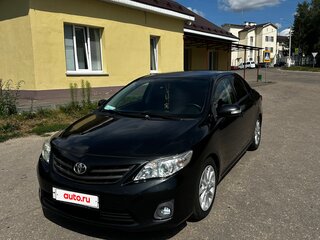 2010 Toyota Corolla X (E140, E150) Рестайлинг, чёрный, 850000 рублей, вид 2