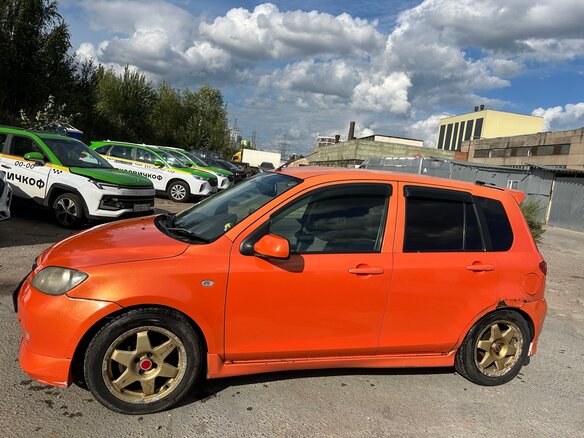 2002 Mazda Demio II (DY), оранжевый, 220000 рублей - вид 7