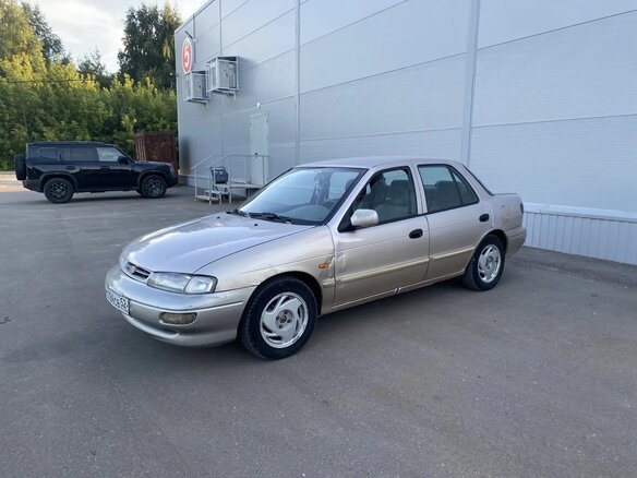 1998 Kia Sephia I Рестайлинг, бежевый, 100000 рублей - вид 1
