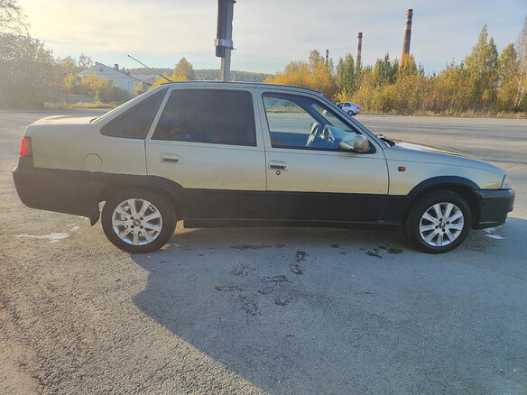 2010 Daewoo Nexia I Рестайлинг, золотистый, 95000 рублей - вид 4
