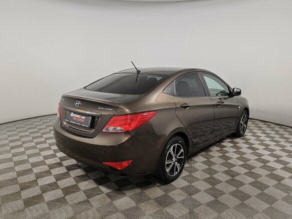 2014 Hyundai Solaris I Рестайлинг, коричневый, 849000 рублей - вид 4
