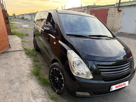 2010 Hyundai Grand Starex I, чёрный, вид 1