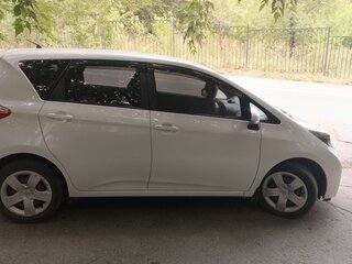 2013 Toyota Ractis II, белый, 1030000 рублей, вид 4