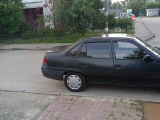2010 Daewoo Nexia I Рестайлинг, чёрный, 100000 рублей, вид 3
