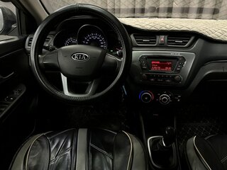 2012 Kia Rio 5-speed III, серый, 649777 рублей, вид 5