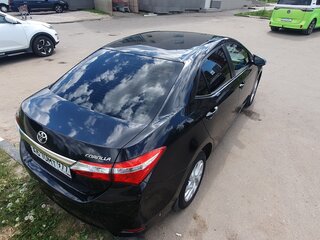 2014 Toyota Corolla XI (E160, E170, E180), чёрный, 1089000 рублей, вид 5