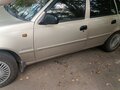 2012 Daewoo Nexia I Рестайлинг, бежевый - вид 1