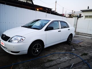 2001 Toyota Corolla IX (E120, E130), белый, 550000 рублей, вид 1