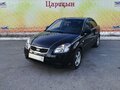 2011 Kia Rio II Рестайлинг, чёрный - вид 1